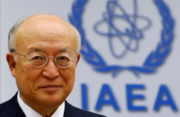 International Atomic Energy Agency (IAEA) Director General Yukiya Amano smiles as he waits for a board of governors meeting to begin at the IAEA headquarters in Vienna, Austria June 6, 2016. REUTERS/Heinz-Peter Bader