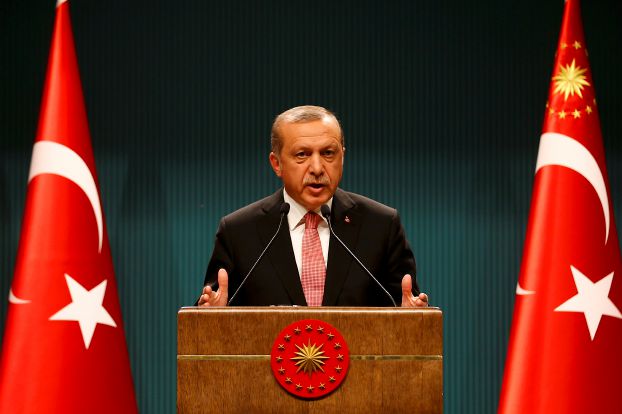 Turkish President Tayyip Erdogan speaks during a news conference following the National Security Council and cabinet meetings at the Presidential Palace in Ankara, Turkey, July 20, 2016. REUTERS/Umit Bektas