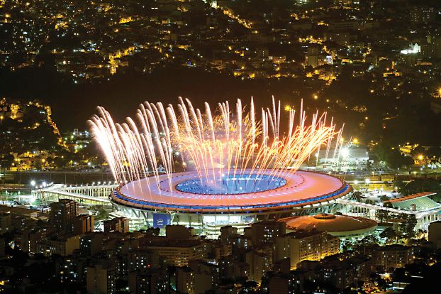 Fireworks are seen during a rehearsal of the opening ceremony of the Rio 2016 Olympic Games in Rio de Janeiro on August 3, 2016. / AFP PHOTO / YASUYOSHI CHIBA